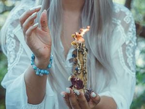 Pagan woman holding a totem